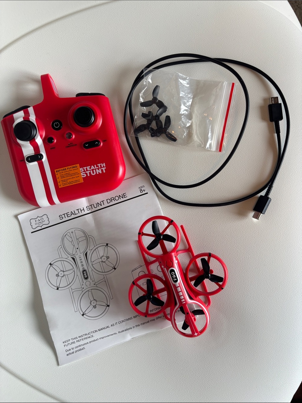 FAO Schwarz Red Stealth Stunt Mini Drone with Controller